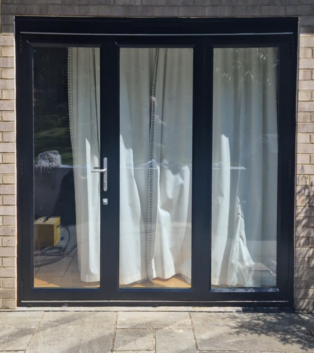 Resprayed anthracite patio doors looking modern and striking